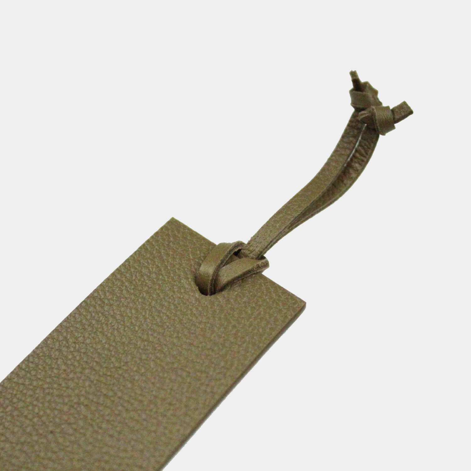 Fine grain leather pointed bookmark with toggle