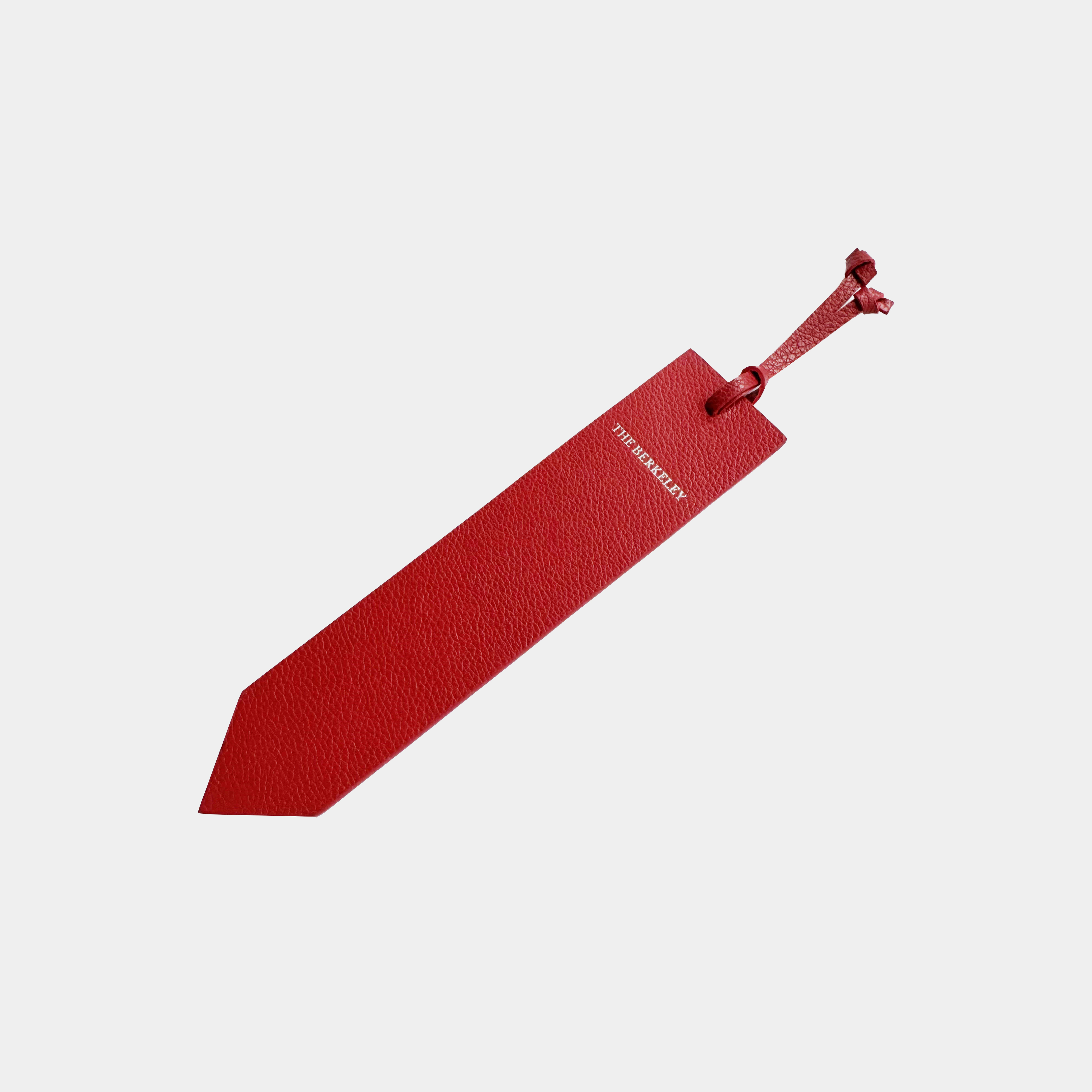 Fine grain leather pointed bookmark with toggle