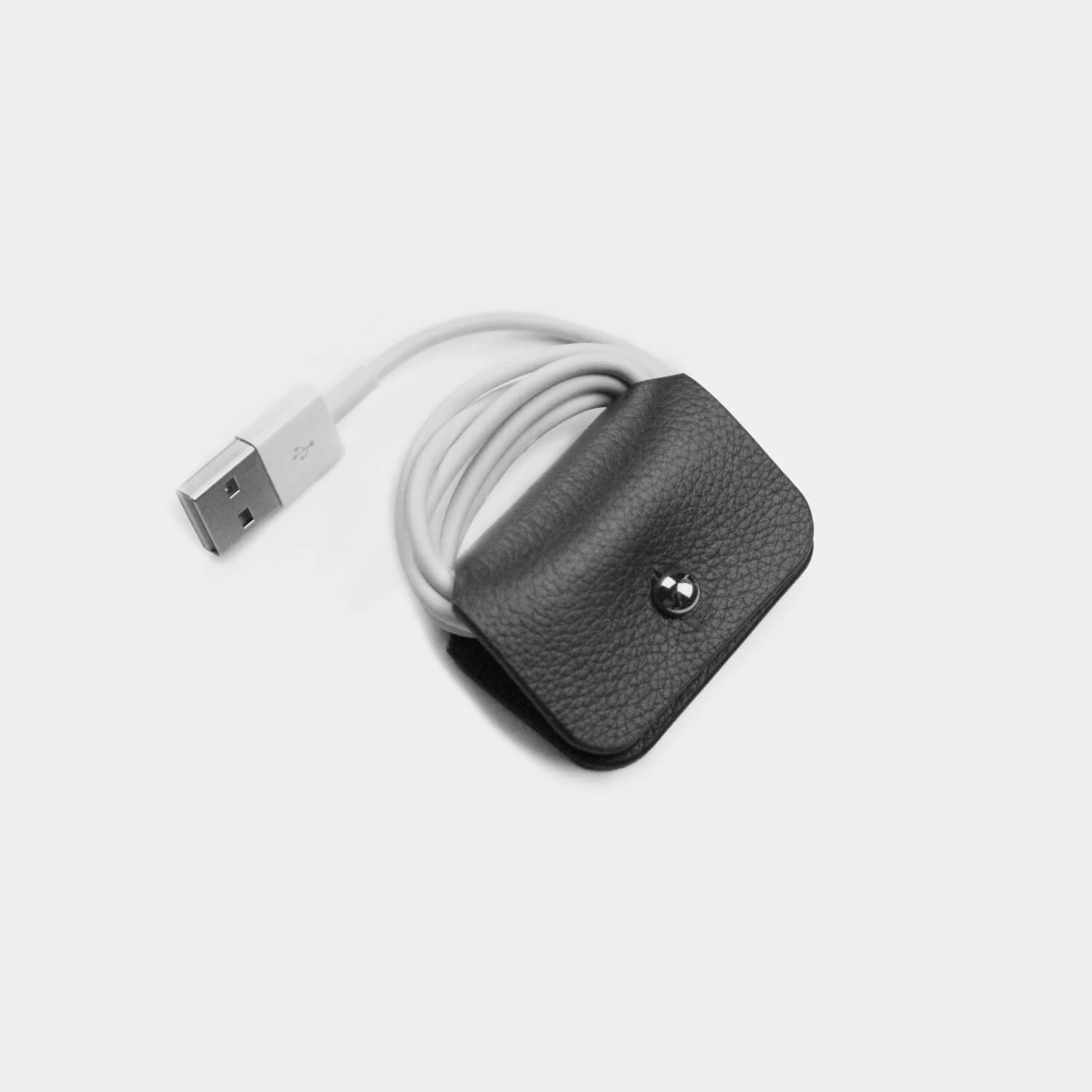 Fine grain leather rectangular cable tidy to store cables and headphones, branded with your company logo