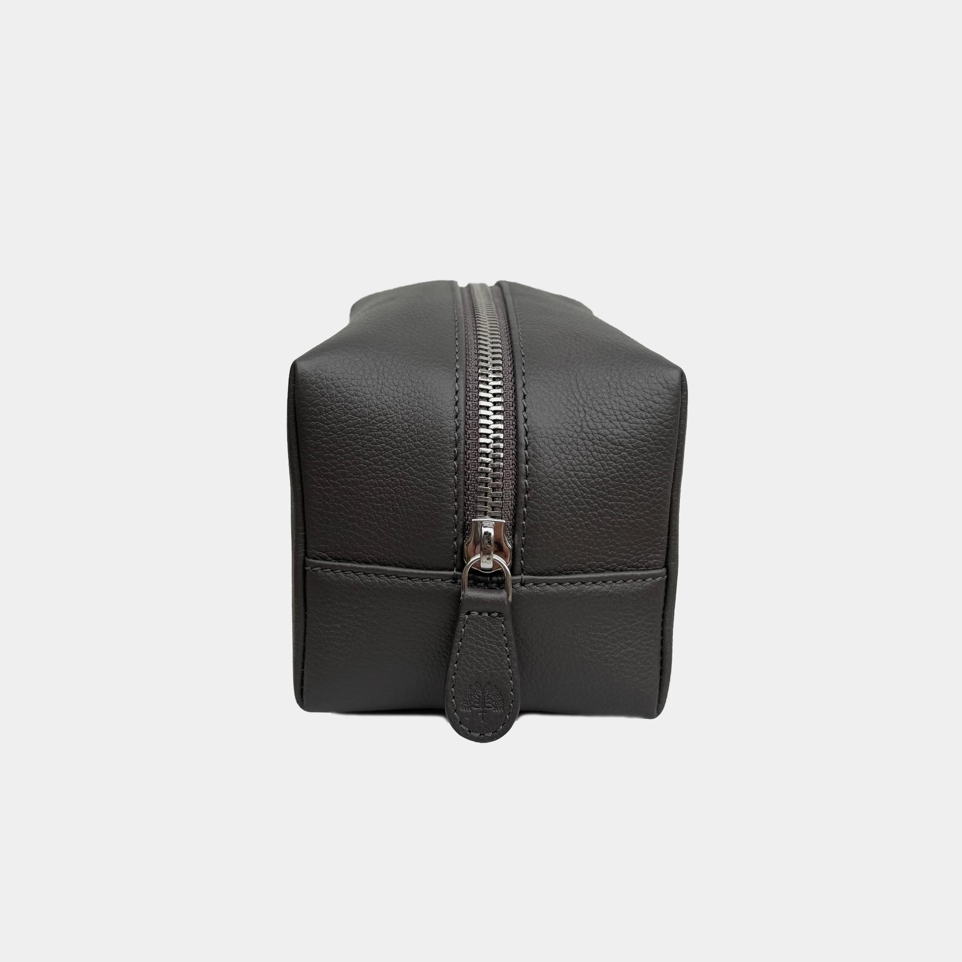 Medium leather wash bag designed for travelling, embossed with your company logo for corporate gifting.