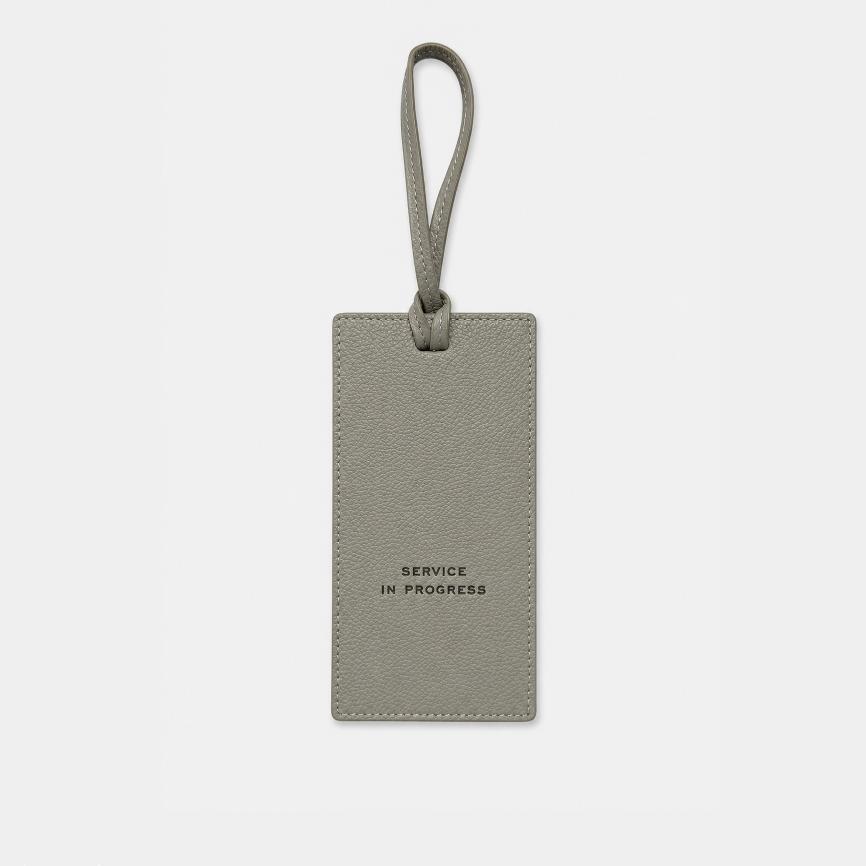 Bespoke leather door hangers for luxury hotels. Embossed or foiled with your logo, in a choice of colours