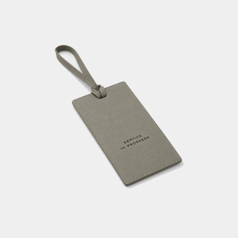 Bespoke leather door hangers for luxury hotels. Embossed or foiled with your logo, in a choice of colours