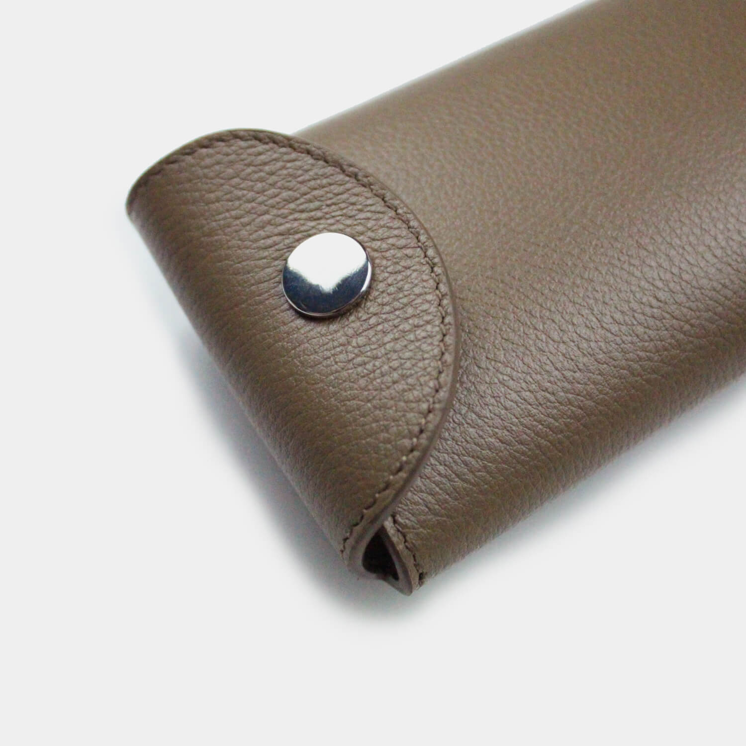 Fine grain leather glasses case with 3 poppers to open to protect and store, branded with your company logo