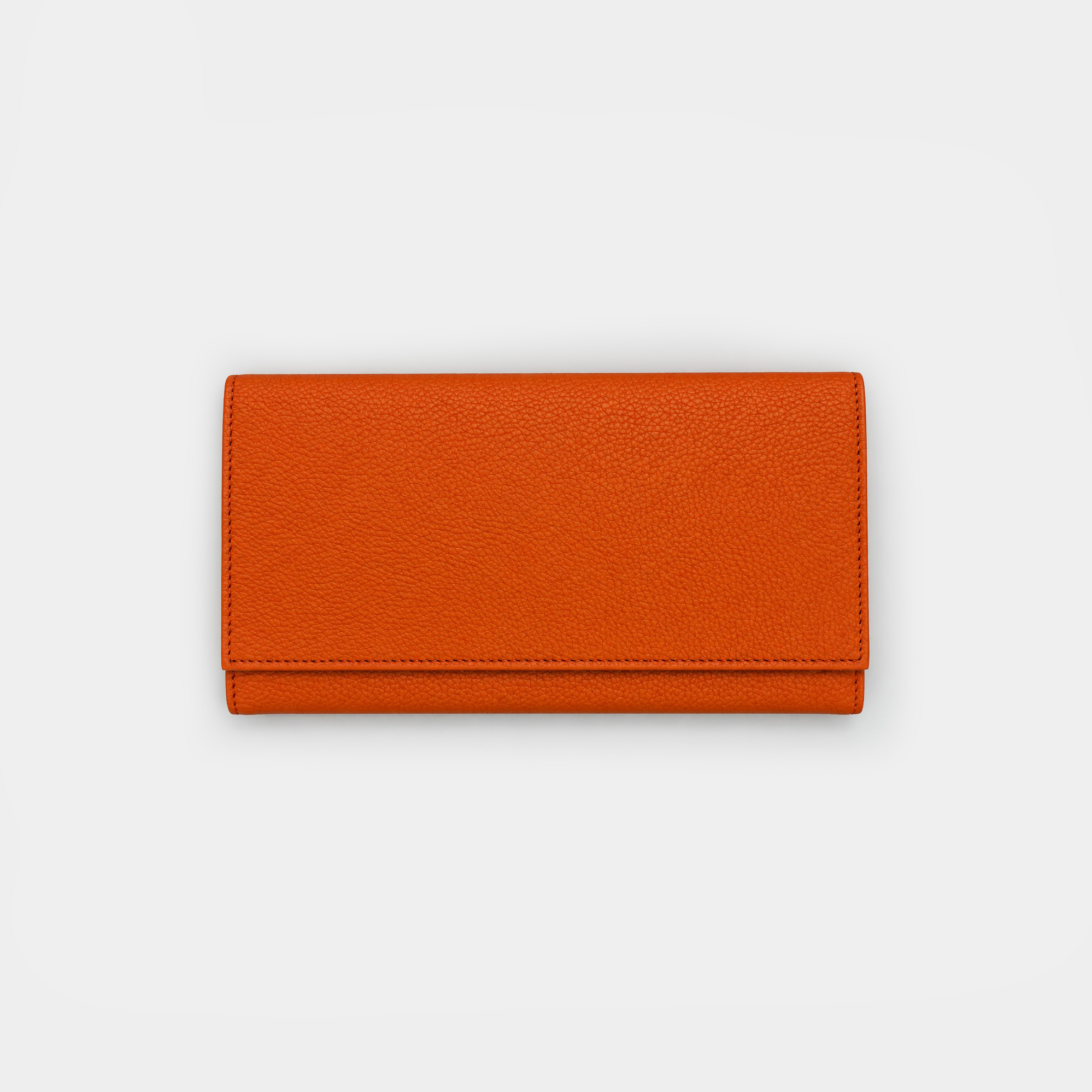 Personalised leather jewellery roll with zip compartments, ring loops and earring holes.