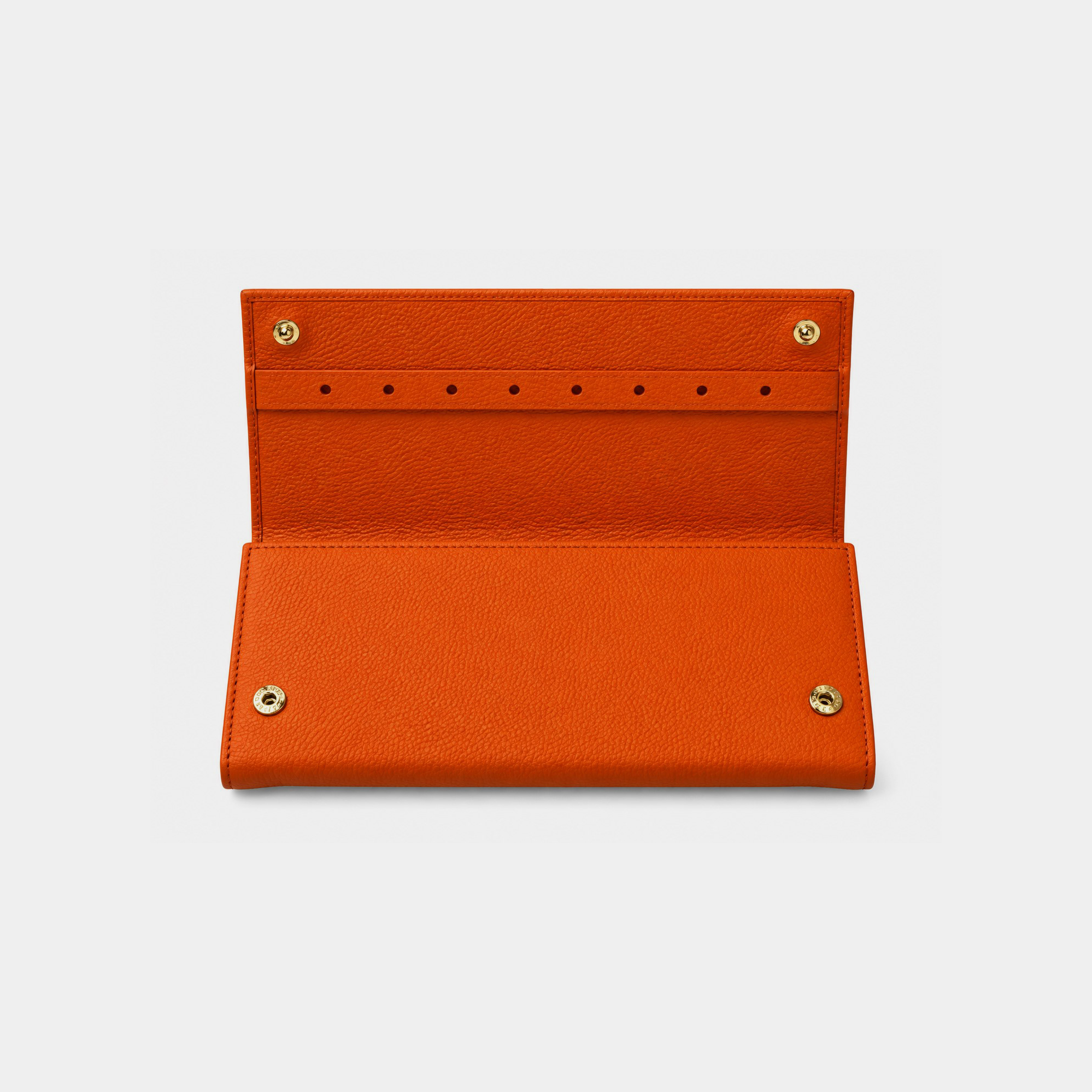 Personalised leather jewellery roll with zip compartments, ring loops and earring holes.