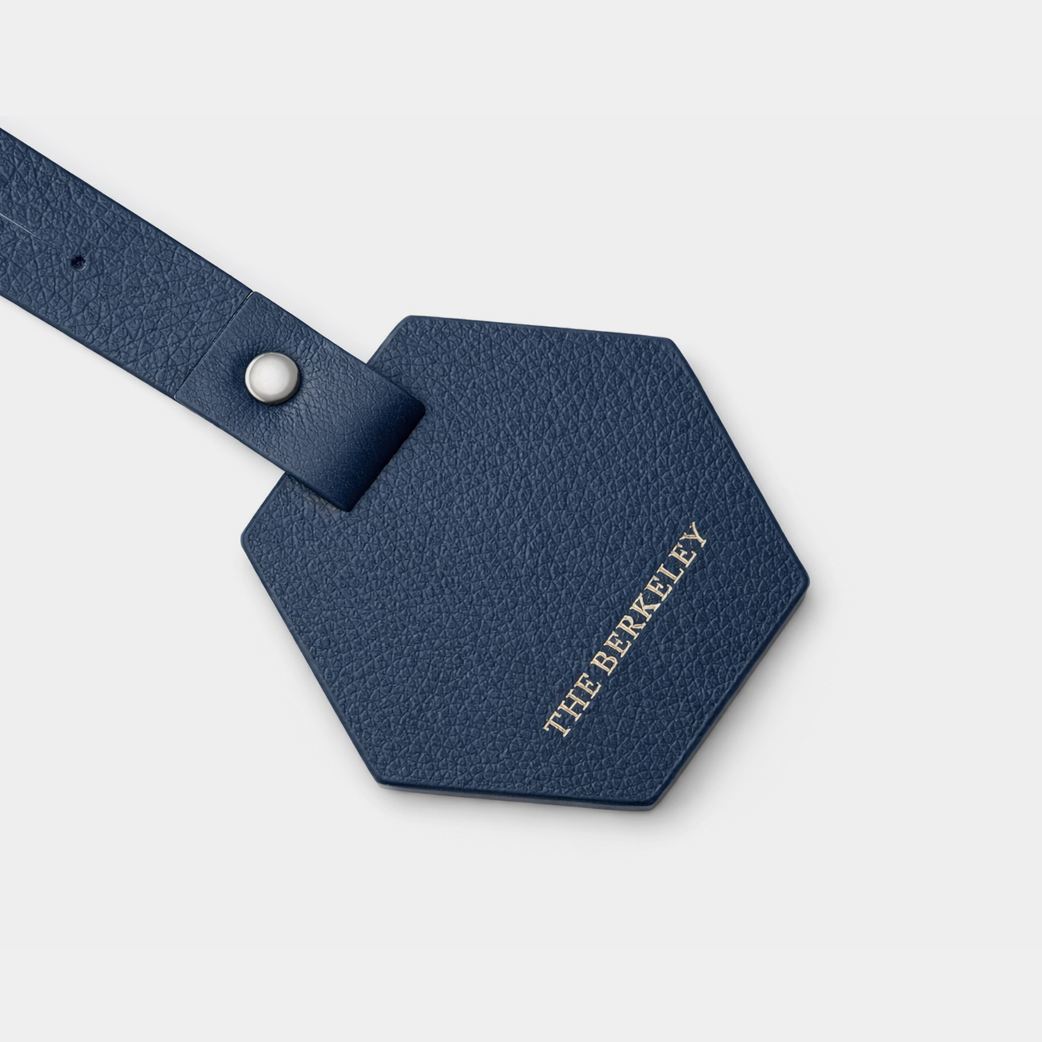 Fine grain leather hexagonal shaped luggage tag and contact details form