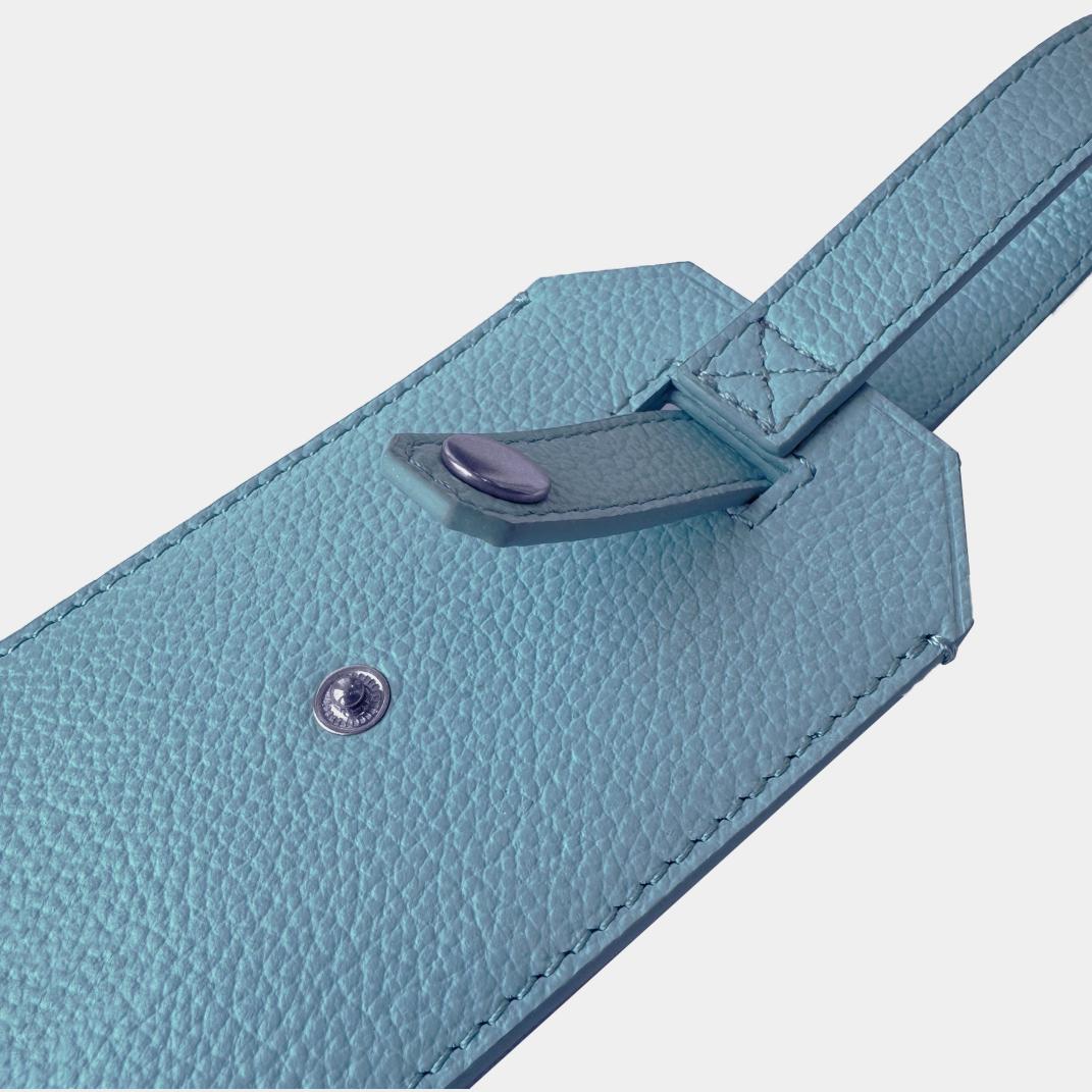 Leather luggage tag with loop strap for attaching to luggage safely