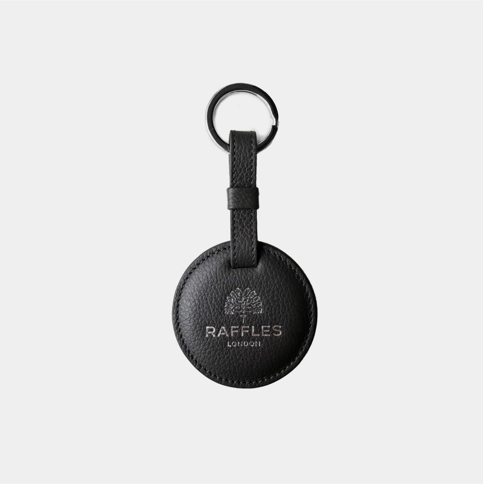 Fine grain leather round padded keyring with gold or silver split ring, branded with your company logo