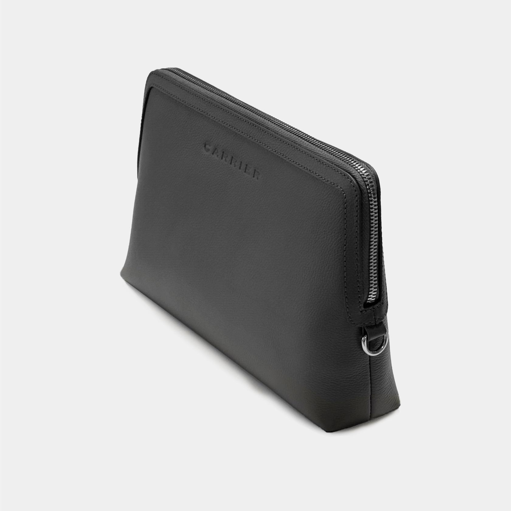 Leather travel pouch with across body strap to hold your travel essentials