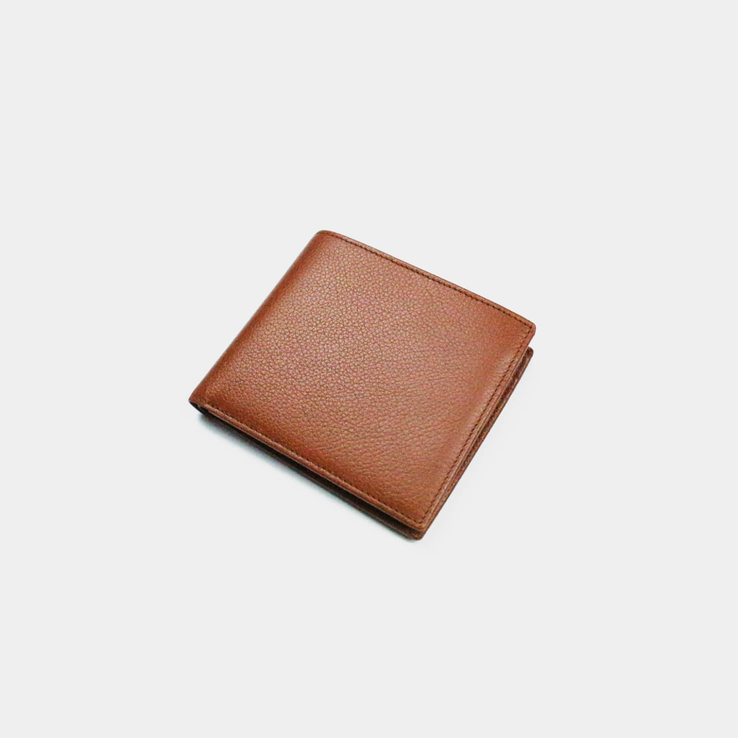 Fine grain leather wallet with 4 card slots, 2 note sections and a coin purse