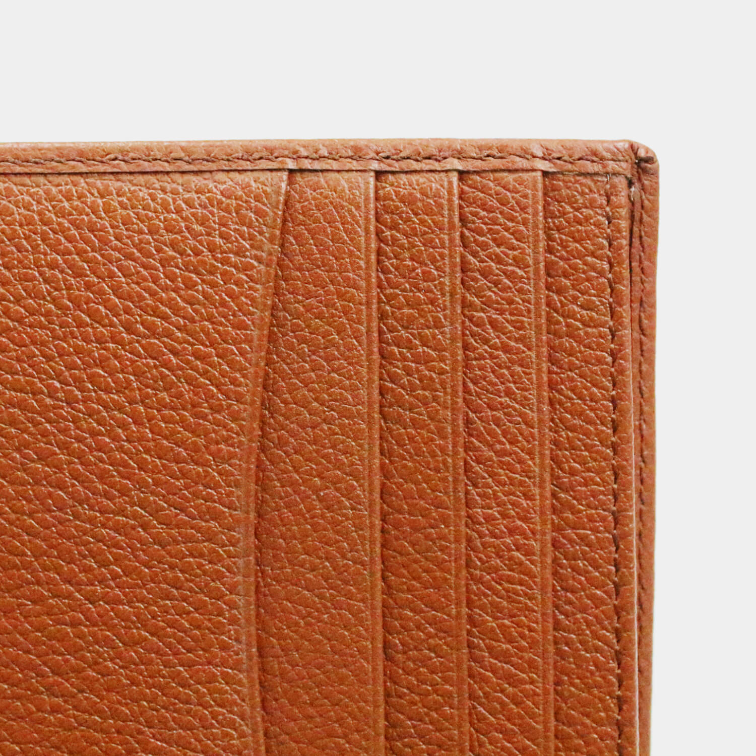 Fine grain leather wallet with 4 card slots, 2 note sections and a coin purse