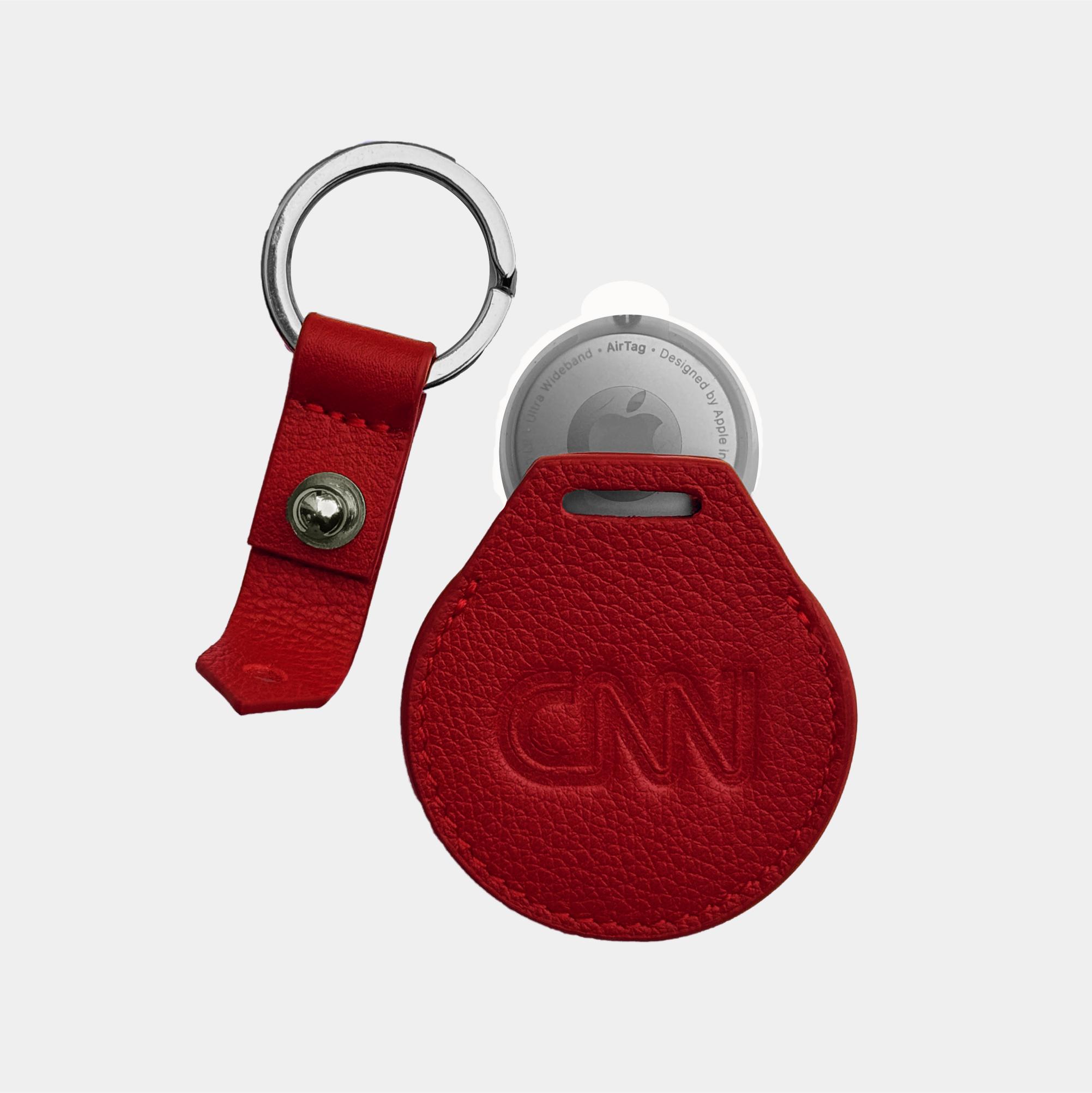 Fine grain leather round keyring designed to hold the Apple AirTag or fob with gold or silver split ring