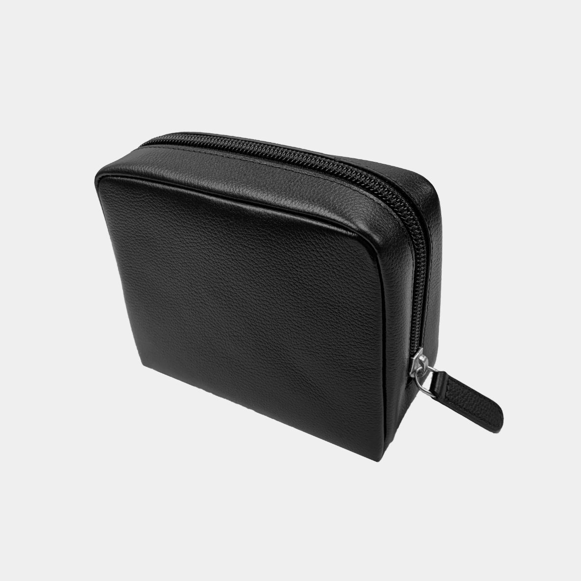 Small leather wash bag designed for overnight stays, embossed with your company logo for corporate gifting.