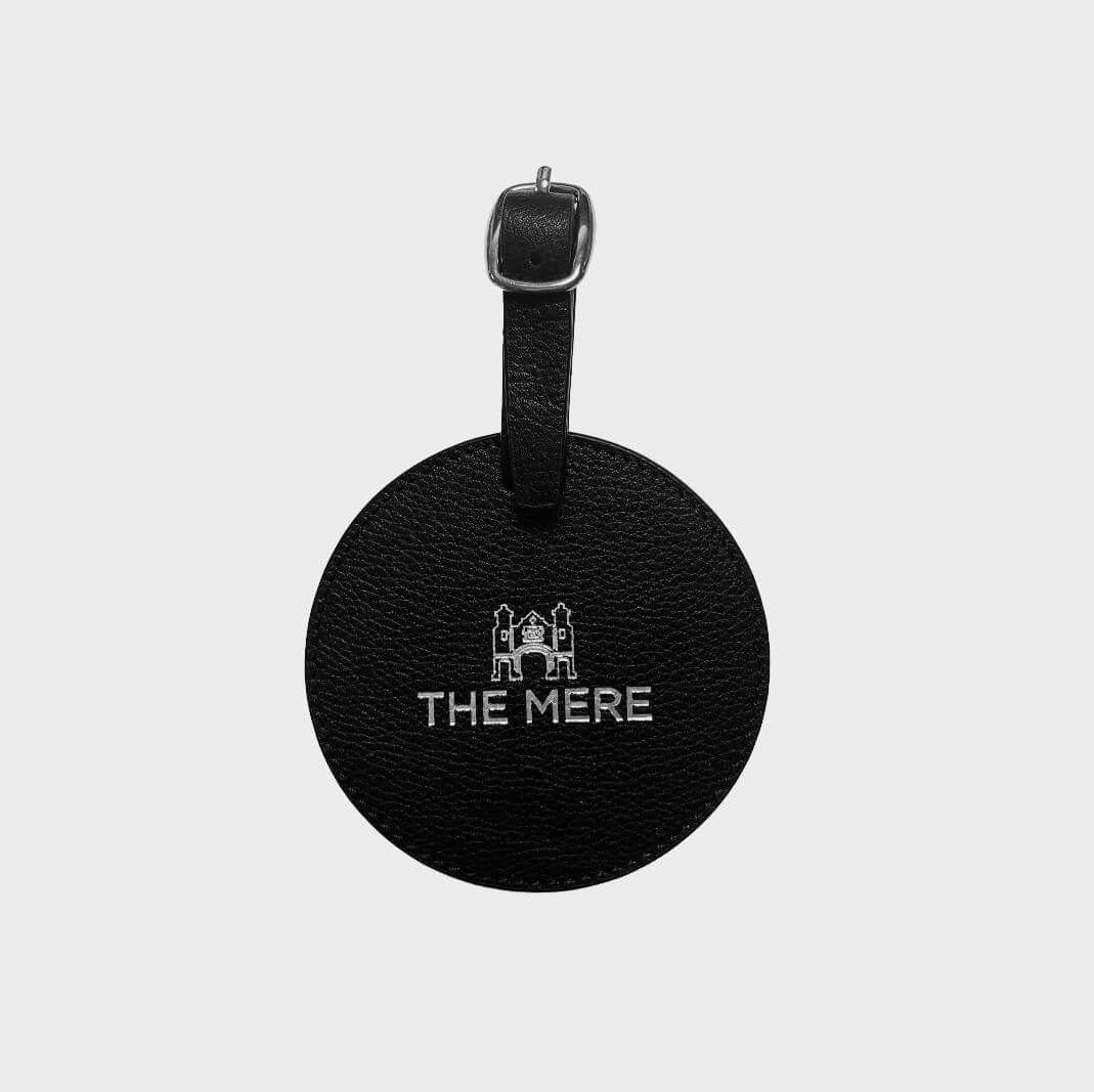 Brand your logo onto this round leather bag tag, luxury merchandise