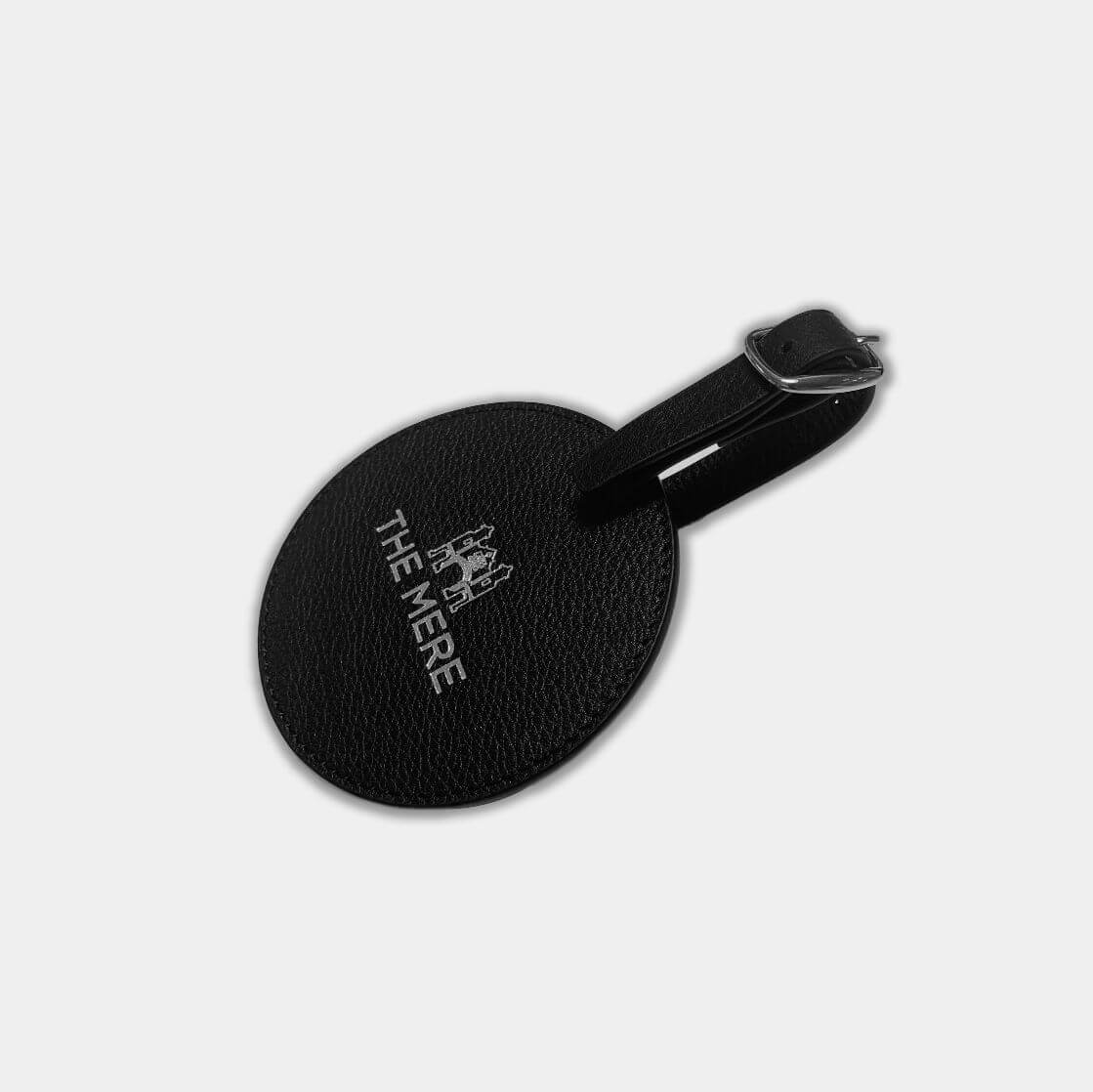 Brand your logo onto this round leather bag tag, luxury merchandise