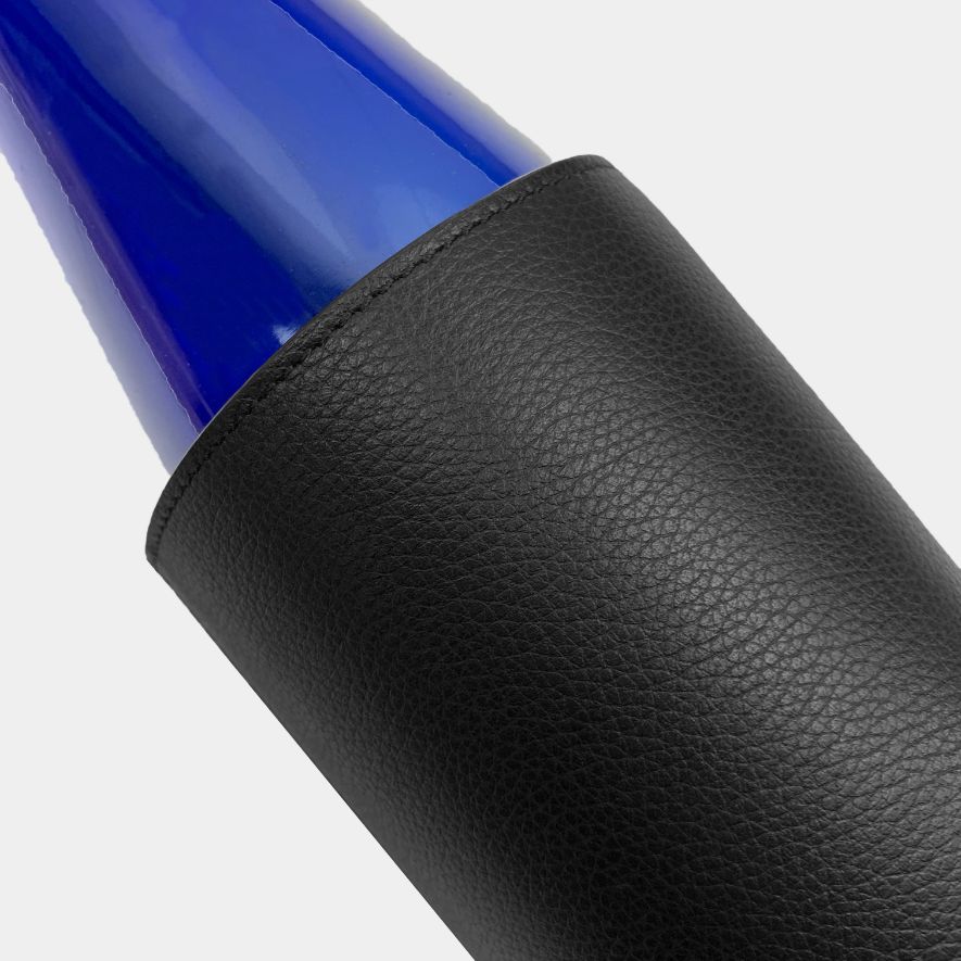 Custom made leather bottle sleeve for wine and champagne, embossed with your brands logo.